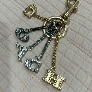 COACH bag charm silver, gold, and gun metal NWOT